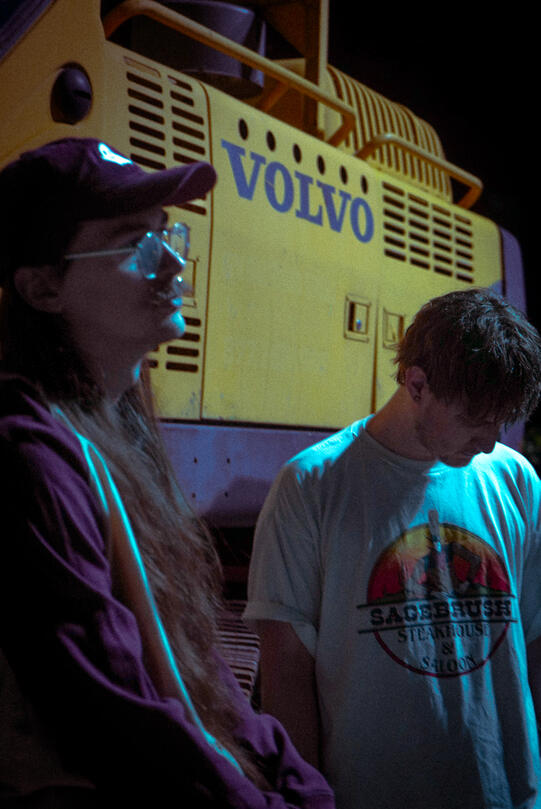 Alternative band The Standby in front of heavy machinery